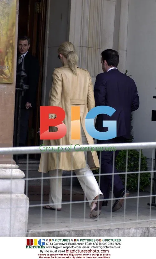Claudia Schiffer Visits Bank