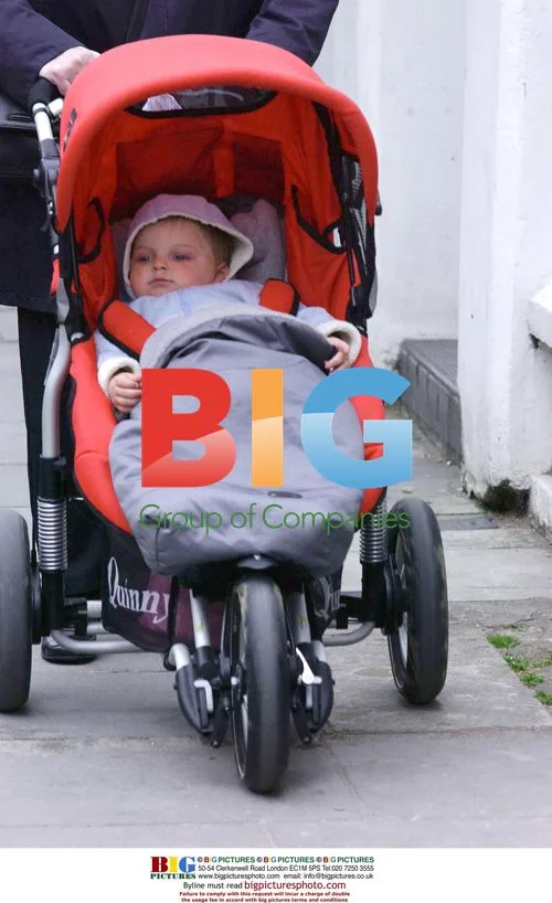 Damien Hurley Taken for Walk by Nanny
