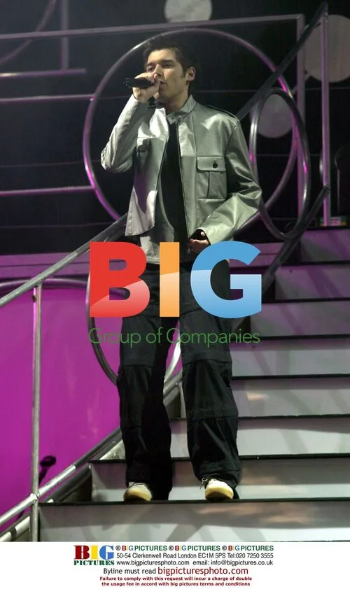 David Sneddon performs with Fame Academy contestants