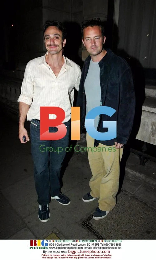 Dennis Gill and Matthew Perry leaving club Aura