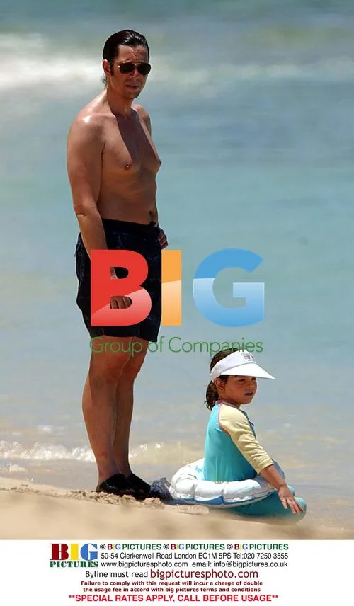 Laurence Llewelyn Bowen and family at Barbados beach