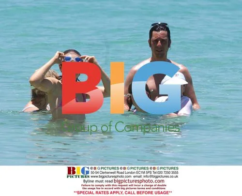 Laurence Llewelyn Bowen and family at Barbados beach