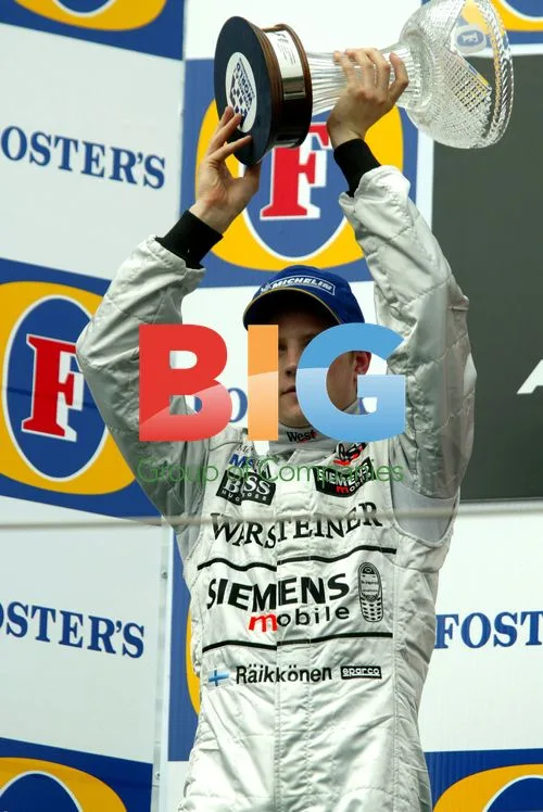Kimi Raikkonen Celebrates Podium Finish