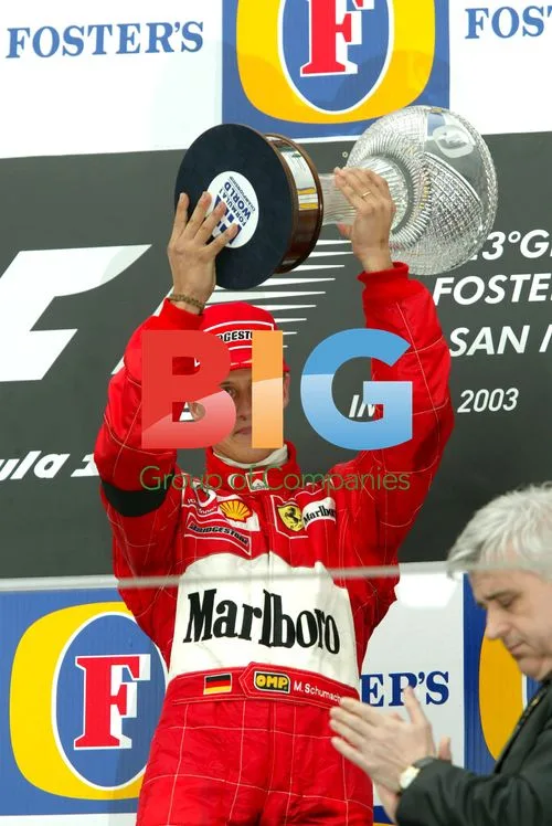 Michael Schumacher Accepts Trophy