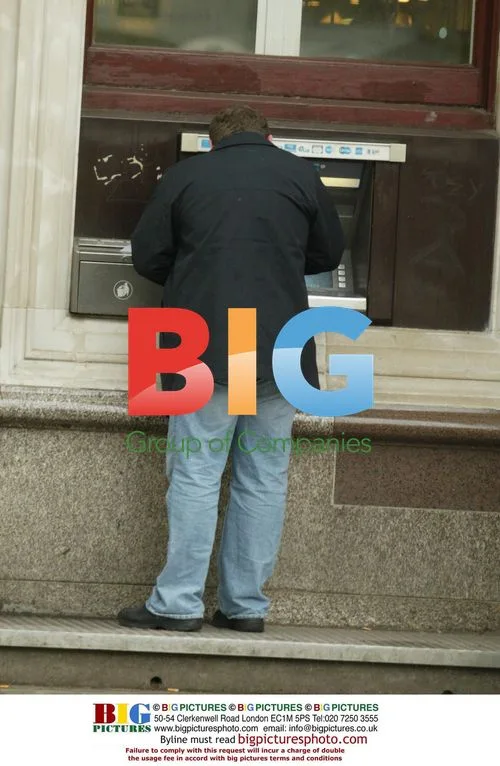 TV Actor John Thompson Makes Stop at Cash Machine