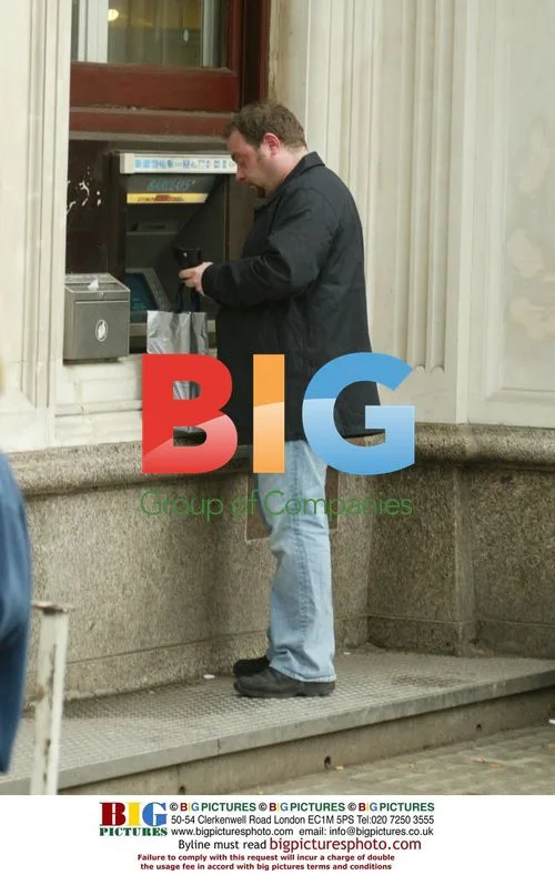 TV Actor John Thompson Stops at Cash Machine