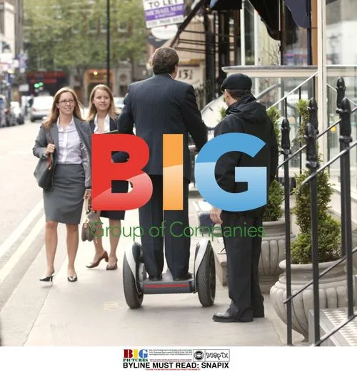 Man Demonstrates Segway Riding