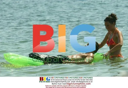 Michelle Heaton Spotted Relaxing on Beach