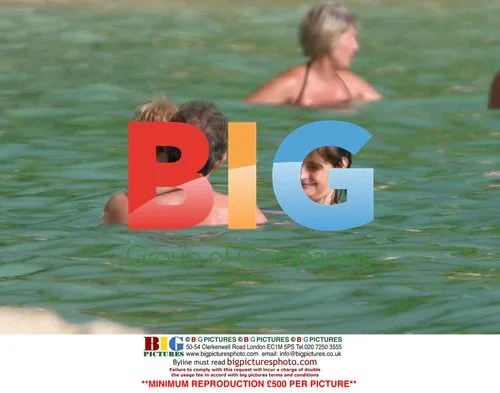 PM Blair on Beach with Family in Barbados