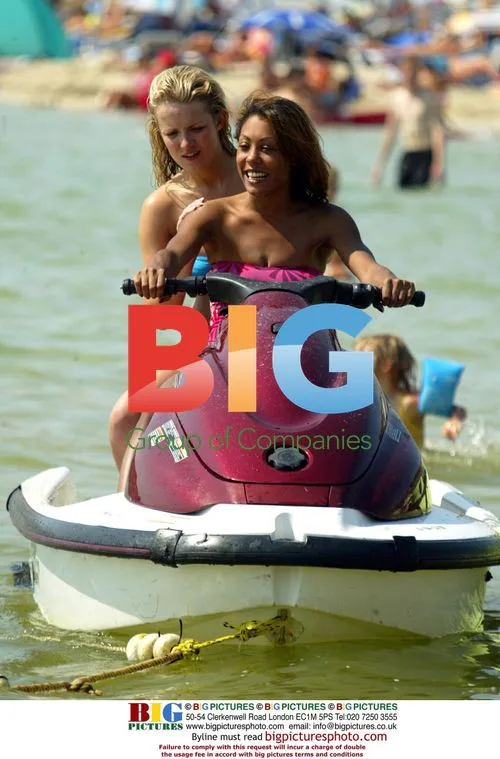 Popl Idol Singer Haley Evetts at Beach in Spain