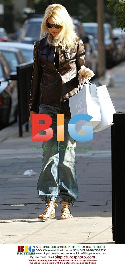 Claudia Schiffer Leaves Home After Shopping