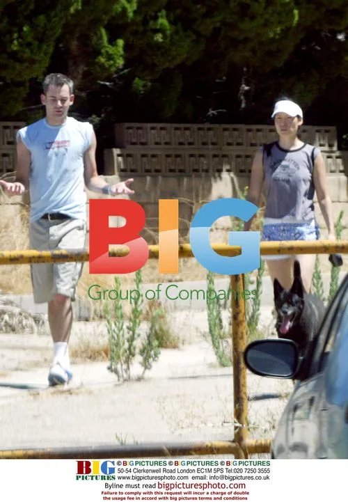 Lucy Liu walks dogs with boyfriend