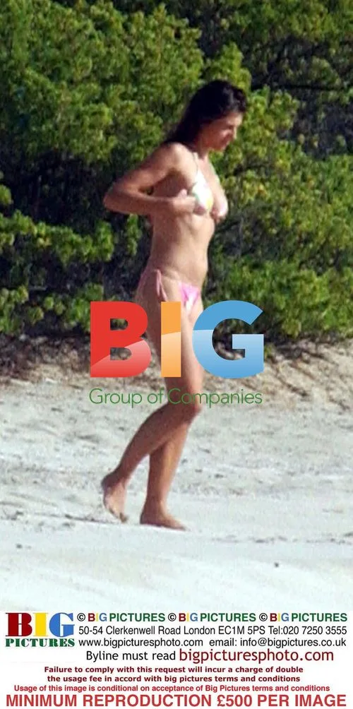 Elizabeth Hurley on Beach with Boyfriend