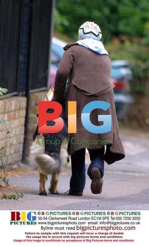 Jesse Wallace Takes Dog for Walk