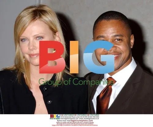 Charlize Theron and Cuba Gooding Jr. at Golden Apple Awards