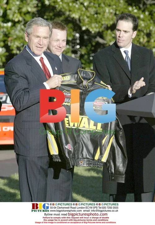 Bush Receives Jacket from NASCAR\'s Kenseth