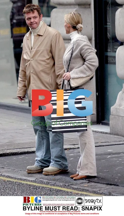 Phil Middlemiss and wife Christmas shopping in London
