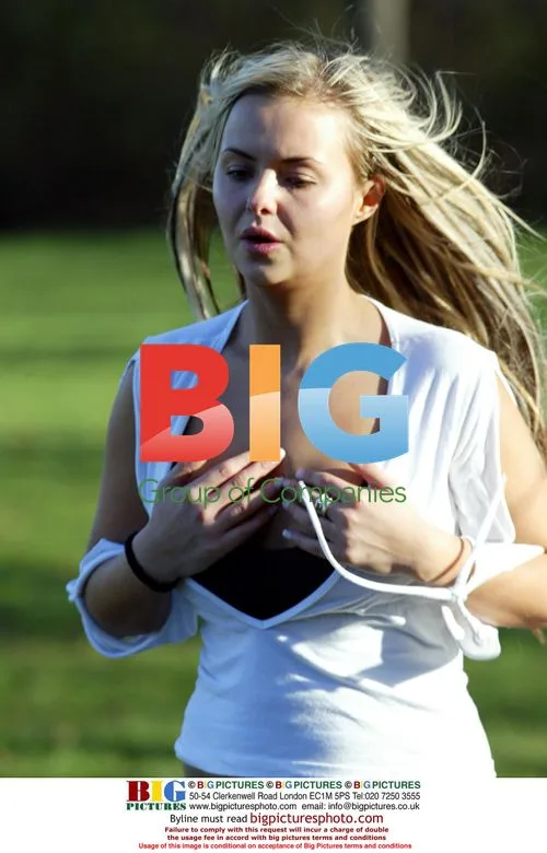 Glamour model Ebony exercises in London park