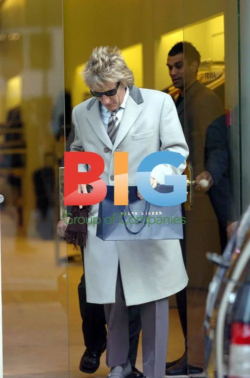 Rod Stewart exiting Prada in London