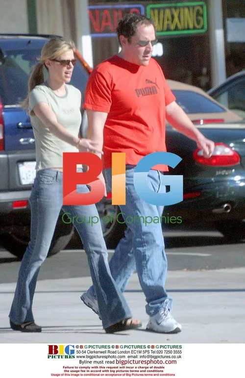 Jon Favreau and wife Joya Tillem stroll in Santa Monica