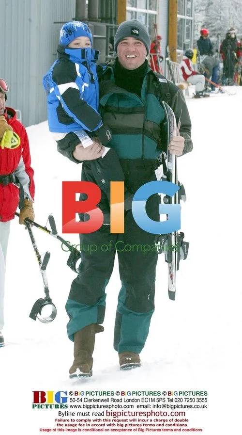 Dean Caine skiing with family in Aspen