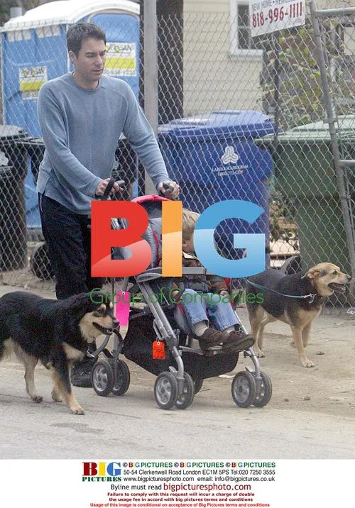 Eric McCormick Out With Son and Dogs