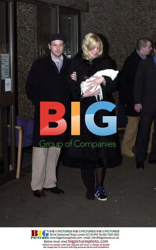 Claudia Schiffer and Matthew Vaughn with newborn