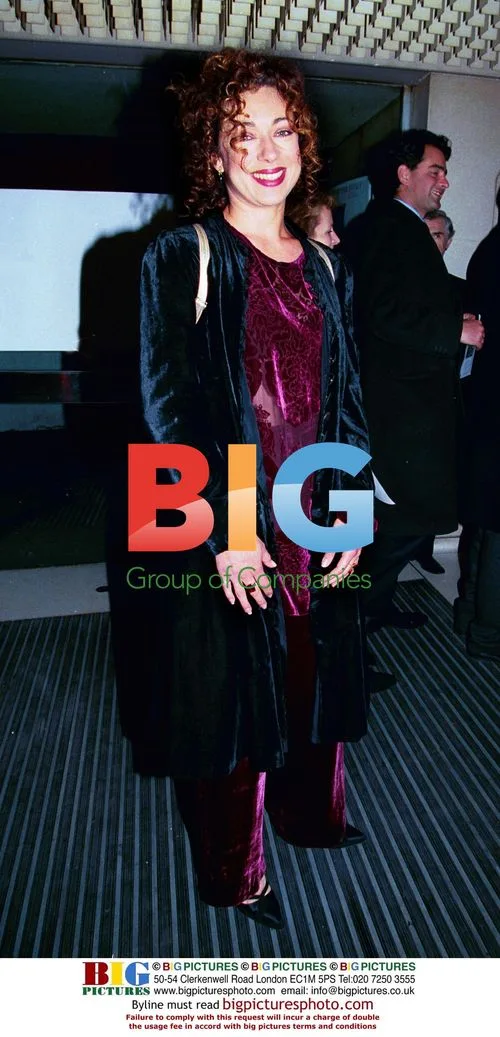 Alex Kingston in Elegant Attire