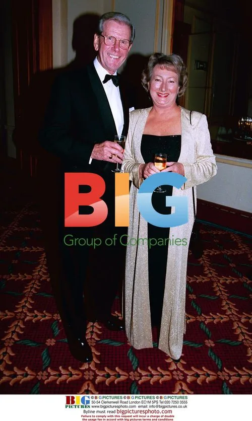 Bob Holness and wife at event