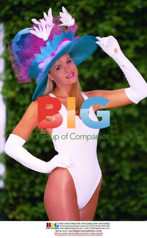 Model Helen Fairbrother in hat fashion with queen lookalike