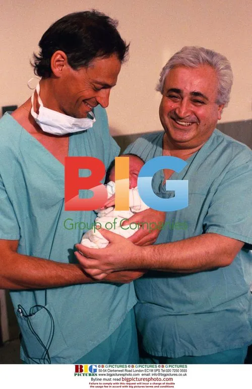 Doctor and nurse with baby