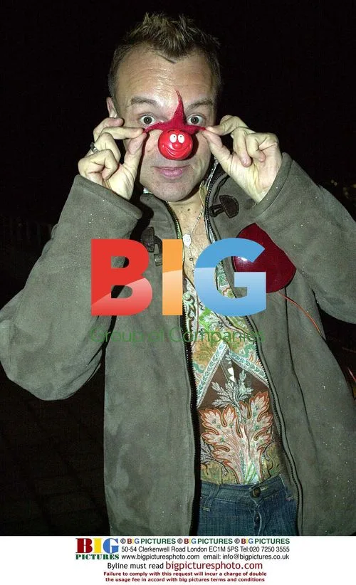 Graham Norton and Angellica Bell turn on Comic Relief lights on BT Tower