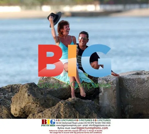 Cilla Black and Dale Winton on Barbados Beach