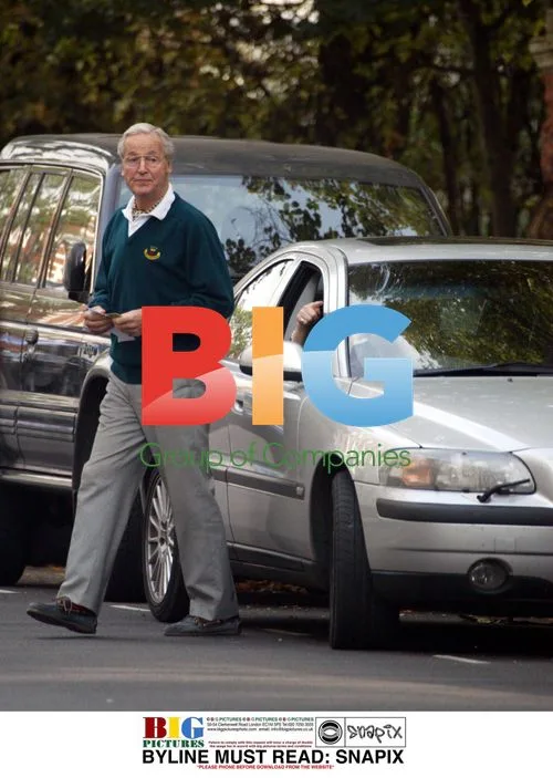 Nicholas Parsons Hurrying From Car