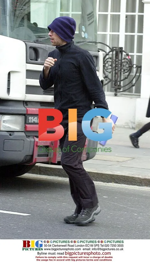 Chris Martin Leaves House