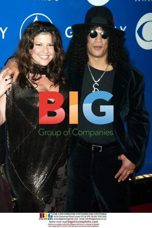 Slash and Perla at 45th Grammys