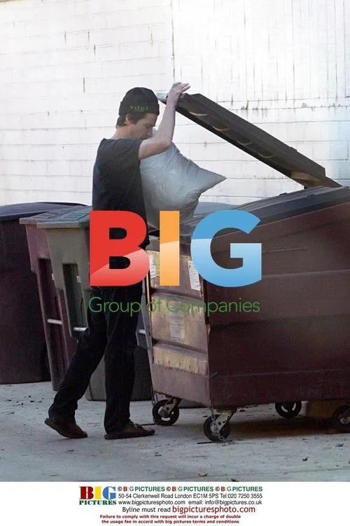 Keanu Reeves Takes Out Trash