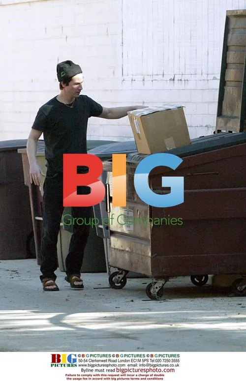 Keanu Reeves Takes Out the Trash