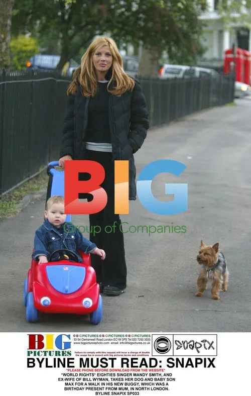 Mandy Smith with dog and baby