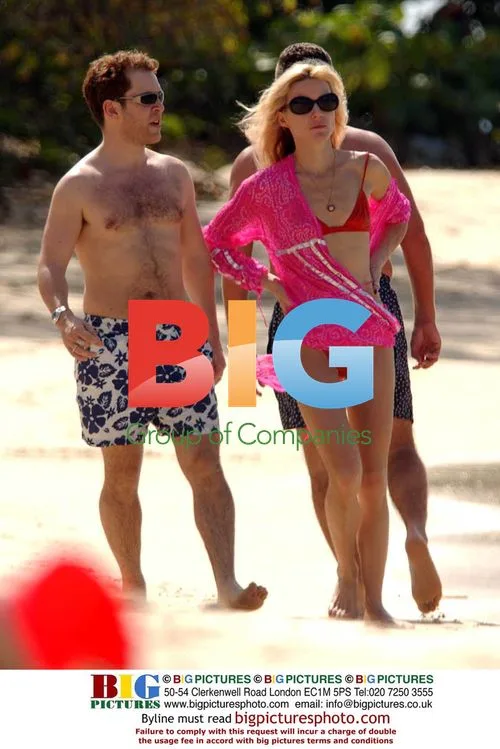 Tom Hollander on beach in Barbados