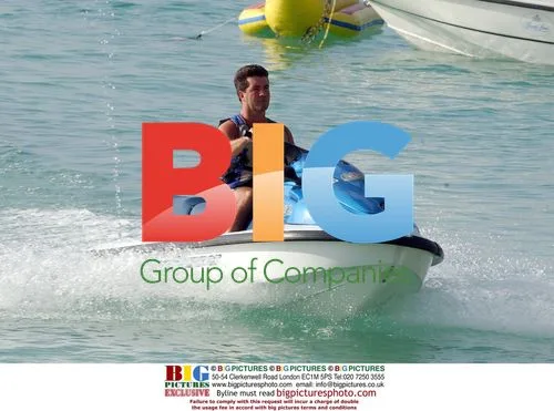 Ryan Seacrest and Simon Cowell Race on Jet Skis