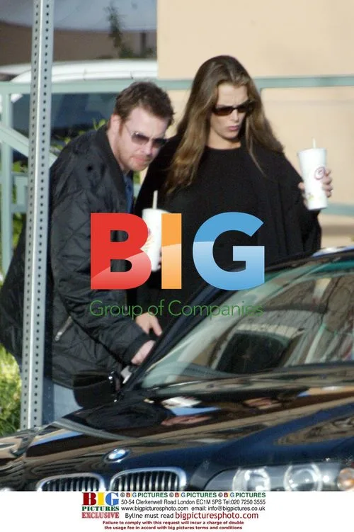 Pregnant Brooke Shields assisted by husband Chris