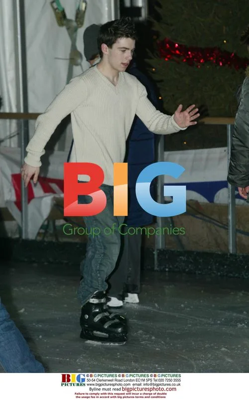 Jamie and Matthew from 'One True Voice' ice skating