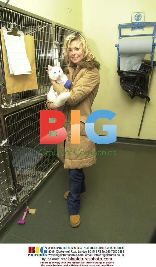 PAGE THREE MODEL JAKKI DEGG WITH CATS