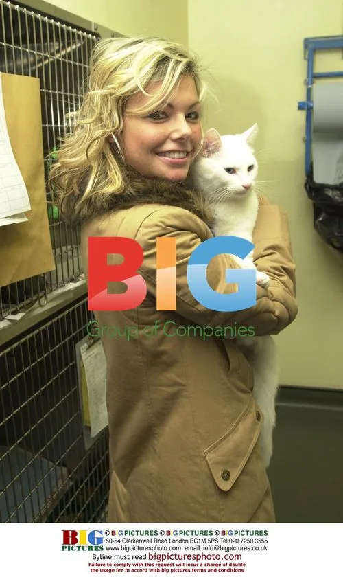 PAGE THREE MODEL JAKKI DEGG WITH CATS
