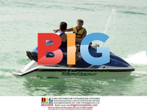 Ryan Seacrest and Simon Cowell Race Jetskis