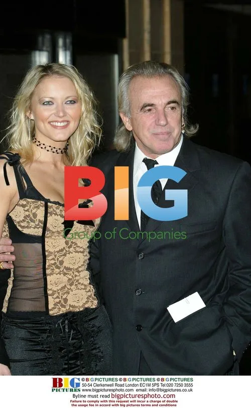 Peter Stringfellow and girlfriend at 'About Schmidt' premiere