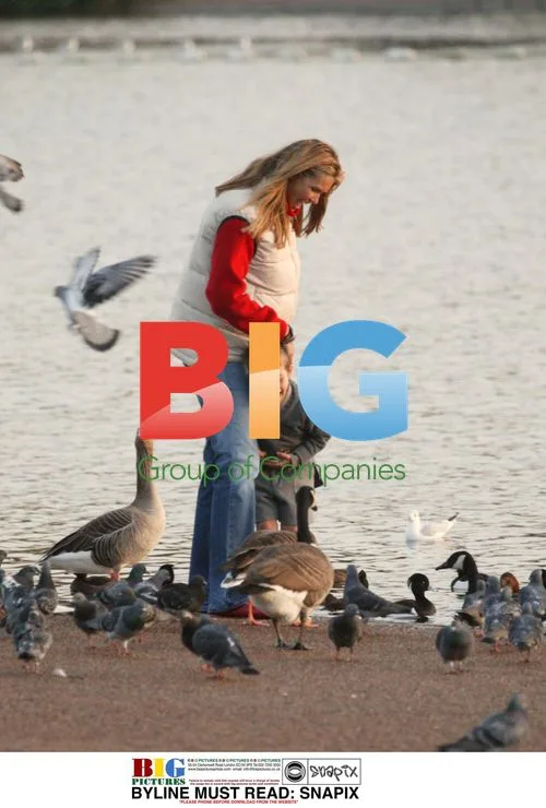 Elle McPherson and Son Feeding Ducks