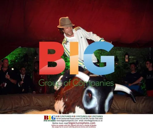 Jamiroquai's Jay Kay rides mechanical bull