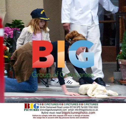 Rene Russo cleans up daughter's vomit